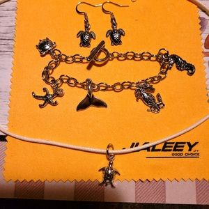Sea charm bracelet w/ matching necklace & earrings